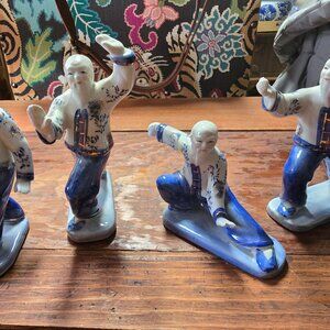 Lot of four Tai Chi ceramic figures